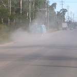 Dust Cloud created by Street Sweeper removing mud carried onto Street from a nearby Concrete Recycling Plant that malfunctioned.
